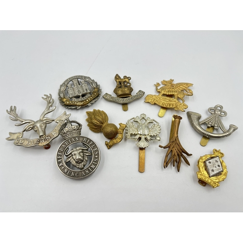 2245 - Ten military cap badges to include The Buffs, The Royal Dragoons, Northamptonshire, Kaffrarian Rifle... 