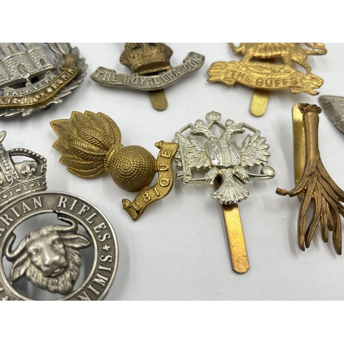 2245 - Ten military cap badges to include The Buffs, The Royal Dragoons, Northamptonshire, Kaffrarian Rifle... 