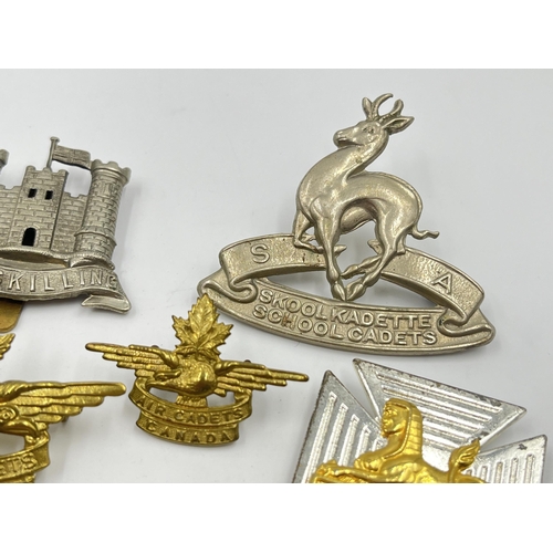 2247 - Twelve military cap badges to include Air Cadets Canada, South African School Cadets, Royal Army Vet... 