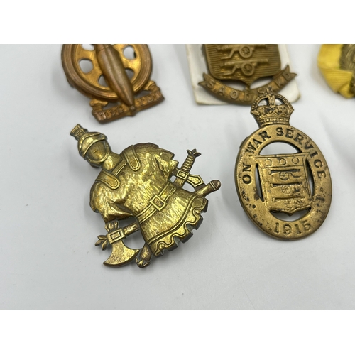 2252 - Six military cap badges to include South African Technical Service Corps, WWI On War Service 1915, S... 