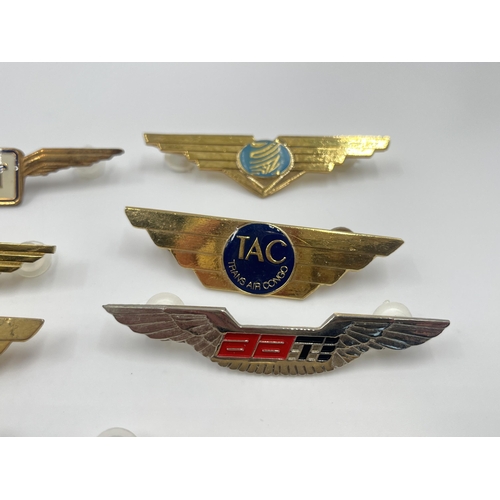 2259 - Eleven airline badges to include Trans Air Benin, Trans Air Congo etc.