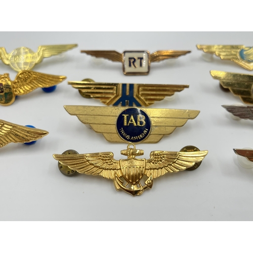 2259 - Eleven airline badges to include Trans Air Benin, Trans Air Congo etc.