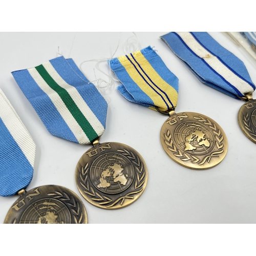 2262 - Five United Nations service medals to include one with Korea clasp etc.