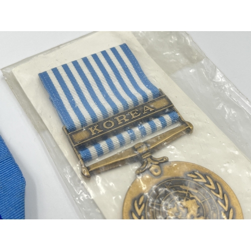 2262 - Five United Nations service medals to include one with Korea clasp etc.