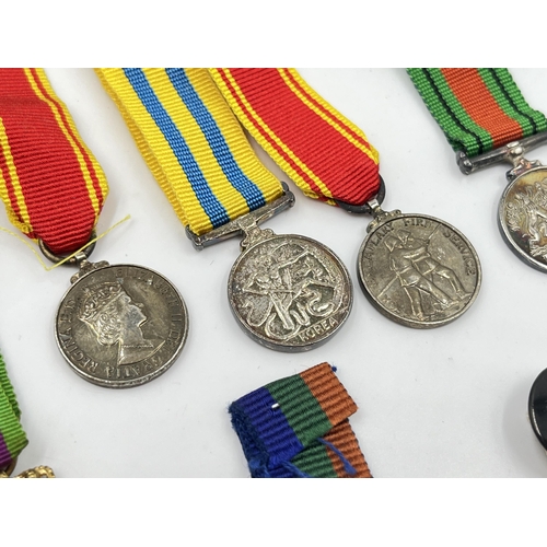 2264 - A collection of miniature medals to include For Exemplary Fire Service, The Defence Medal, Korea etc... 