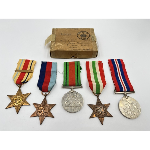 2270 - Five WWII medals, The Defence, War, The 1939-1945 Star, The Africa Star and The Italy Star with docu... 