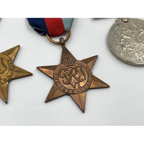 2270 - Five WWII medals, The Defence, War, The 1939-1945 Star, The Africa Star and The Italy Star with docu... 