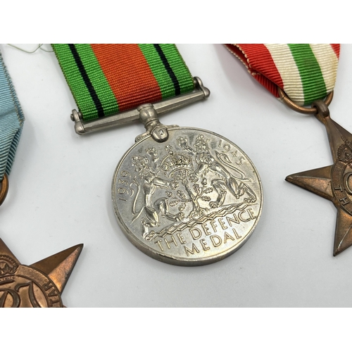 2270 - Five WWII medals, The Defence, War, The 1939-1945 Star, The Africa Star and The Italy Star with docu... 