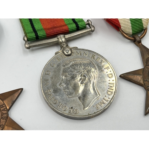 2270 - Five WWII medals, The Defence, War, The 1939-1945 Star, The Africa Star and The Italy Star with docu... 