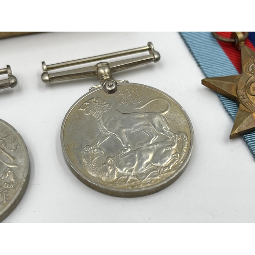 2271 - Four WWII medals, The Defence, War, The 1939-1945 Star and The France and Germany Star with document... 