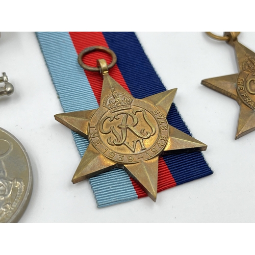 2271 - Four WWII medals, The Defence, War, The 1939-1945 Star and The France and Germany Star with document... 