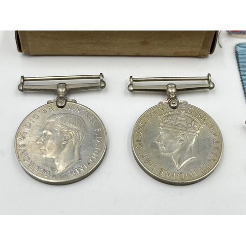 2271 - Four WWII medals, The Defence, War, The 1939-1945 Star and The France and Germany Star with document... 