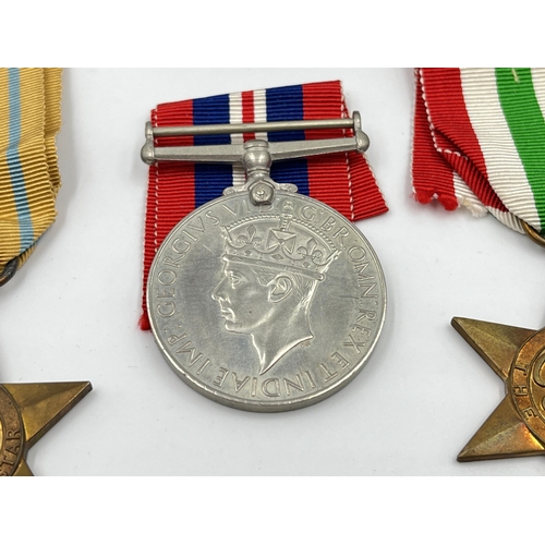 2273 - Four WWII medals, The 1939-1945 Star, War, The Africa Star and The Italy Star with box