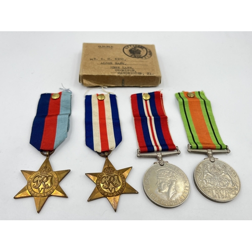 2275 - Four WWII medals, The Defence, War, The 1939-1945 Star and The France and Germany Star with document... 