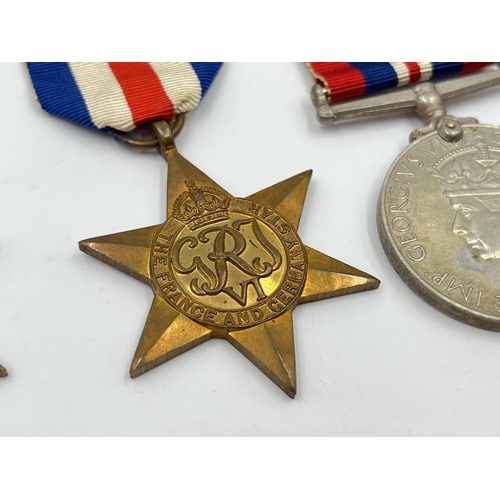 2275 - Four WWII medals, The Defence, War, The 1939-1945 Star and The France and Germany Star with document... 