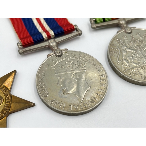 2275 - Four WWII medals, The Defence, War, The 1939-1945 Star and The France and Germany Star with document... 