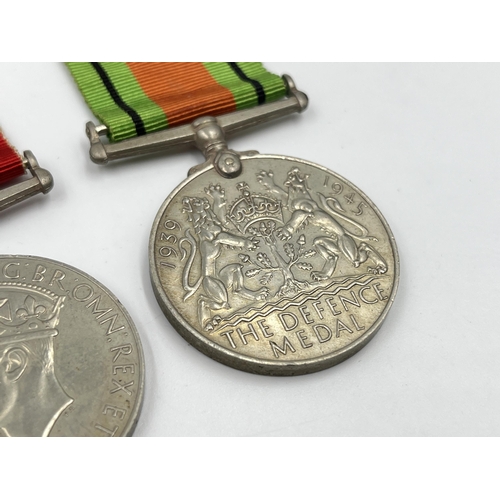 2275 - Four WWII medals, The Defence, War, The 1939-1945 Star and The France and Germany Star with document... 