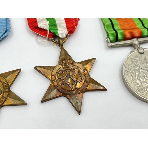 2276 - Four WWII medals, The Defence, War, The 1939-1945 Star and The Italy Star with box