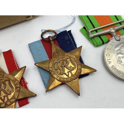 2279 - Five WWII medals, The Defence, War, The 1939-1945 Star, The Italy Star and The Africa Star with box