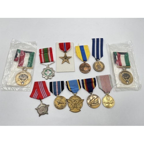 2281 - A collection of medals to include Poland Prison Service, North Vietnam Resolution for Victory 1st Cl... 