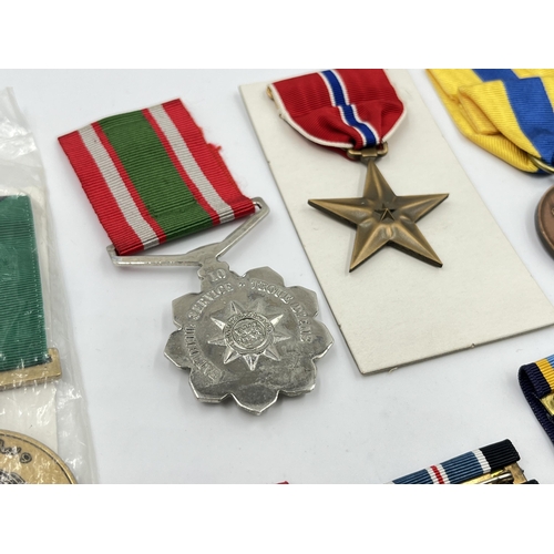 2281 - A collection of medals to include Poland Prison Service, North Vietnam Resolution for Victory 1st Cl... 