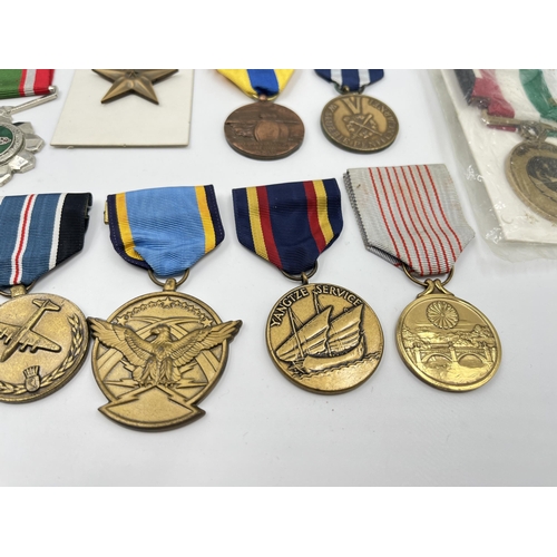 2281 - A collection of medals to include Poland Prison Service, North Vietnam Resolution for Victory 1st Cl... 