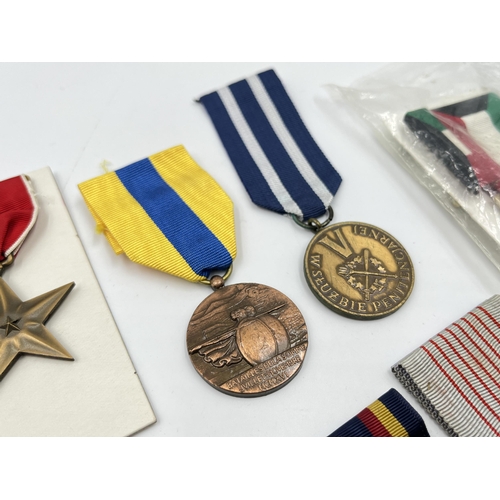 2281 - A collection of medals to include Poland Prison Service, North Vietnam Resolution for Victory 1st Cl... 