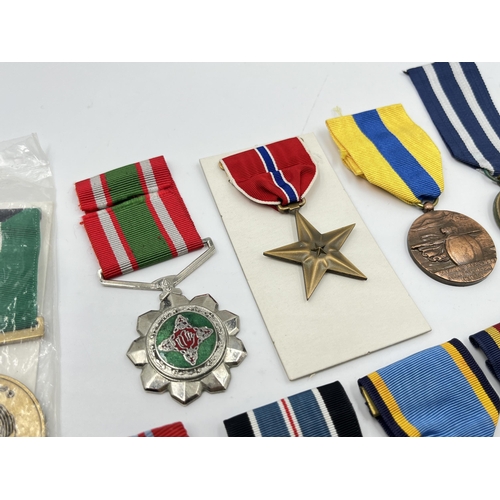 2281 - A collection of medals to include Poland Prison Service, North Vietnam Resolution for Victory 1st Cl... 