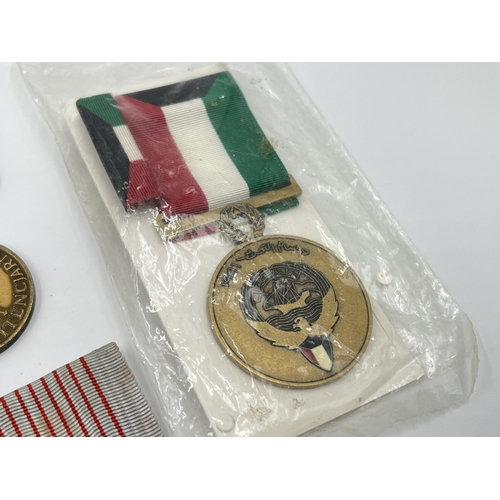 2281 - A collection of medals to include Poland Prison Service, North Vietnam Resolution for Victory 1st Cl... 