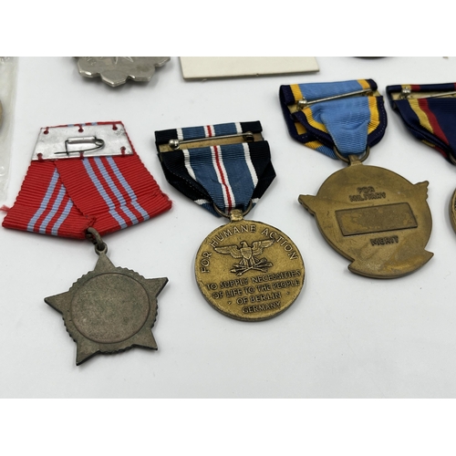 2281 - A collection of medals to include Poland Prison Service, North Vietnam Resolution for Victory 1st Cl... 