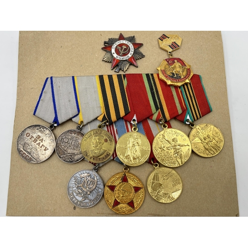 2282 - A collection of Russian medals to include two groups, Order of The Patriotic War Star etc.