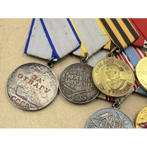 2282 - A collection of Russian medals to include two groups, Order of The Patriotic War Star etc.