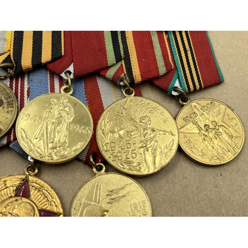 2282 - A collection of Russian medals to include two groups, Order of The Patriotic War Star etc.