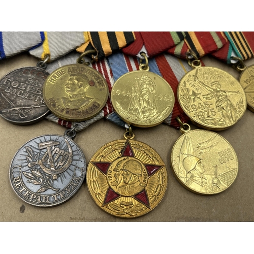 2282 - A collection of Russian medals to include two groups, Order of The Patriotic War Star etc.