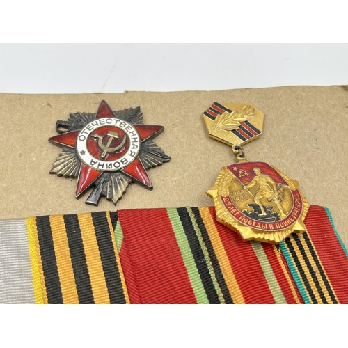 2282 - A collection of Russian medals to include two groups, Order of The Patriotic War Star etc.