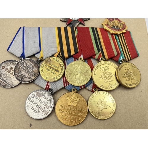 2282 - A collection of Russian medals to include two groups, Order of The Patriotic War Star etc.