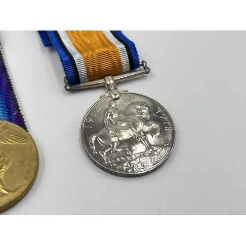 2283 - A boxed WWI medal pair issued to PTE. Herbert. Smith Durh.L.I, one Victory and one War with original... 