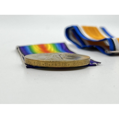 2283 - A boxed WWI medal pair issued to PTE. Herbert. Smith Durh.L.I, one Victory and one War with original... 