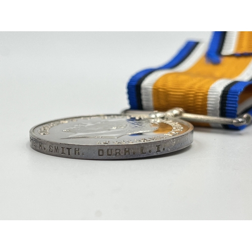 2283 - A boxed WWI medal pair issued to PTE. Herbert. Smith Durh.L.I, one Victory and one War with original... 