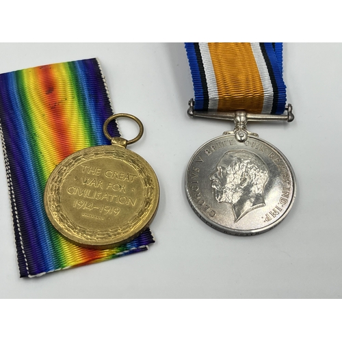 2283 - A boxed WWI medal pair issued to PTE. Herbert. Smith Durh.L.I, one Victory and one War with original... 