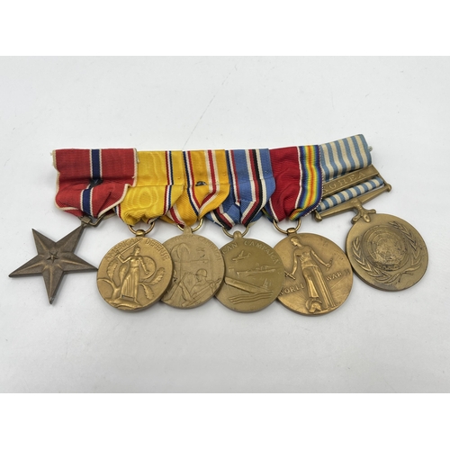 2286 - A WWII USA medal group comprising Korea Service, Victory, American Campaign, Asiatic Pacific Campaig... 