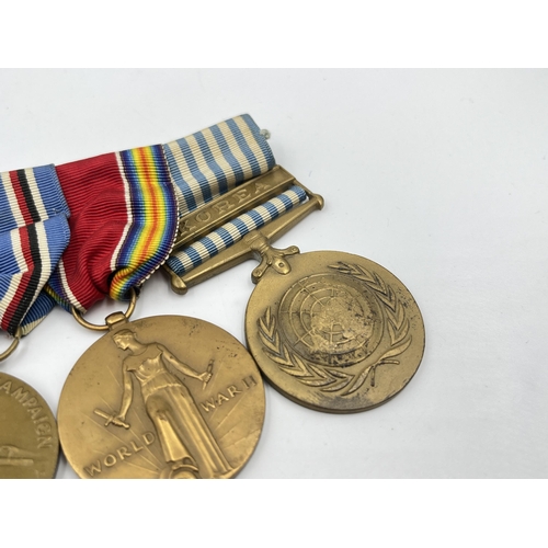 2286 - A WWII USA medal group comprising Korea Service, Victory, American Campaign, Asiatic Pacific Campaig... 