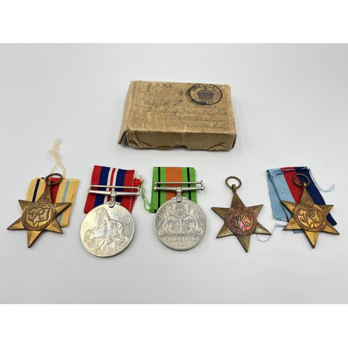 2287 - A WWII medal box containing five WWII British medals comprising France & Germany Star, Africa Star, ... 