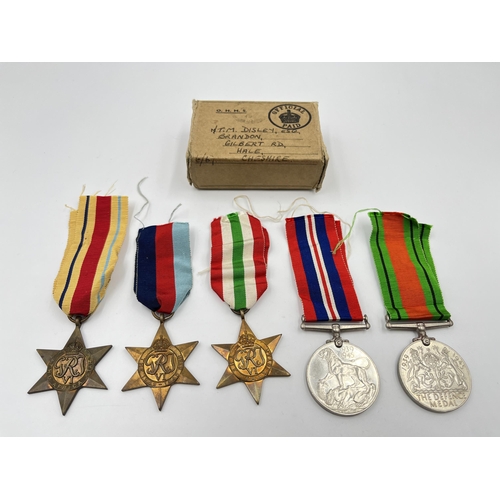 2289 - Five WWII medals comprising Italy, Africa and 1939-45 Stars, Defence and Victory together with WWII ... 