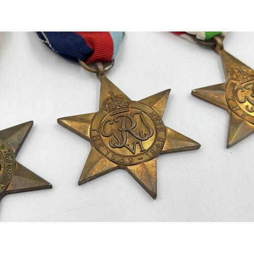 2289 - Five WWII medals comprising Italy, Africa and 1939-45 Stars, Defence and Victory together with WWII ... 