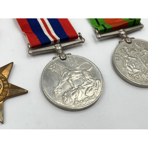 2289 - Five WWII medals comprising Italy, Africa and 1939-45 Stars, Defence and Victory together with WWII ... 