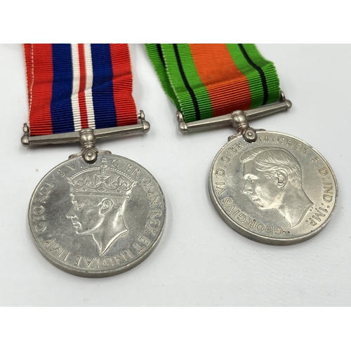 2289 - Five WWII medals comprising Italy, Africa and 1939-45 Stars, Defence and Victory together with WWII ... 