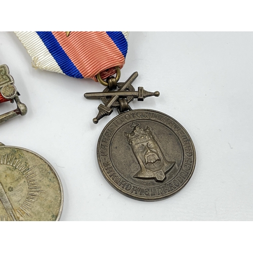 2293 - Five military medals to include India General Service, Serbia medal for bravery, Spanish Civil War V... 