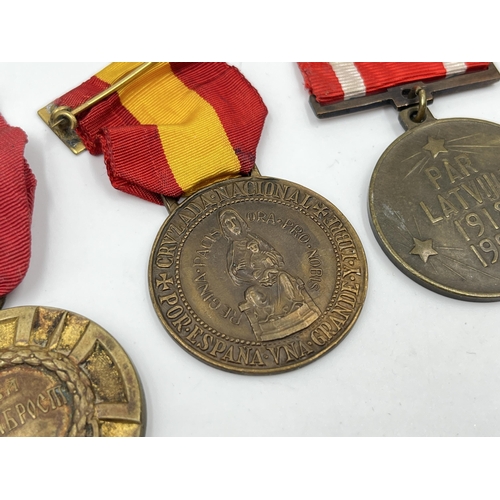 2293 - Five military medals to include India General Service, Serbia medal for bravery, Spanish Civil War V... 