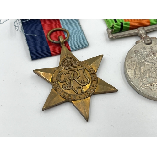 2294 - Five WWII medals, The Defence, The 1939-1945 Star, The France and Germany Star, The Italy Star and T... 